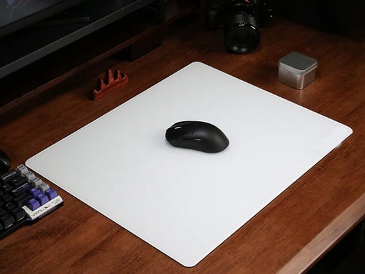 Engineering the Ultimate Glide: How GOGOFREE Achieves Micrometer-Level Flatness in Glass Mousepads